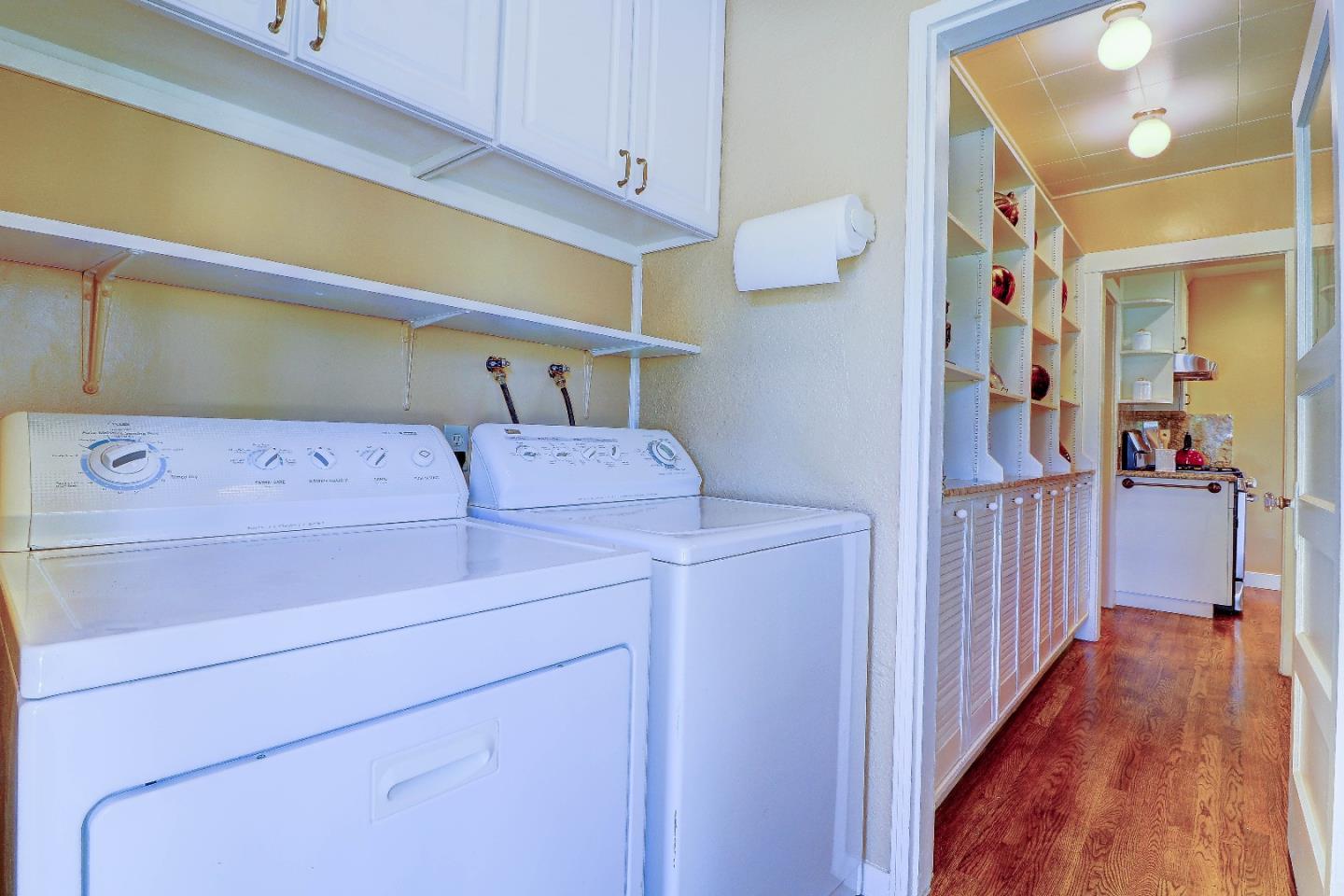 2701 Hillside Drive Burlingame, CA 94010 - Photo 22 of 50 a view of walk in closet with clothes and shoes