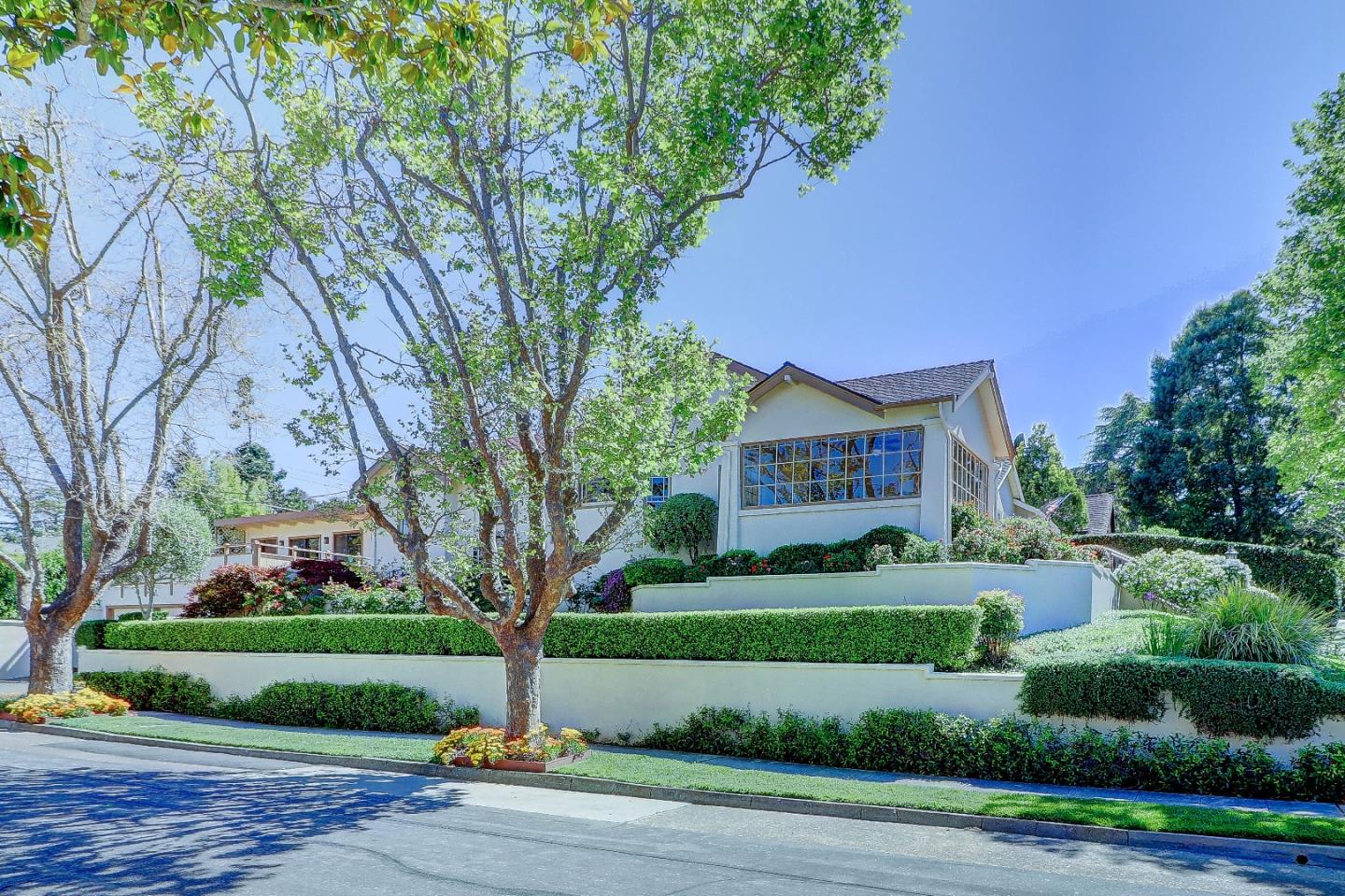 2701 Hillside Drive Burlingame, CA 94010 - Photo 3 of 50 a front view of a house with a yard