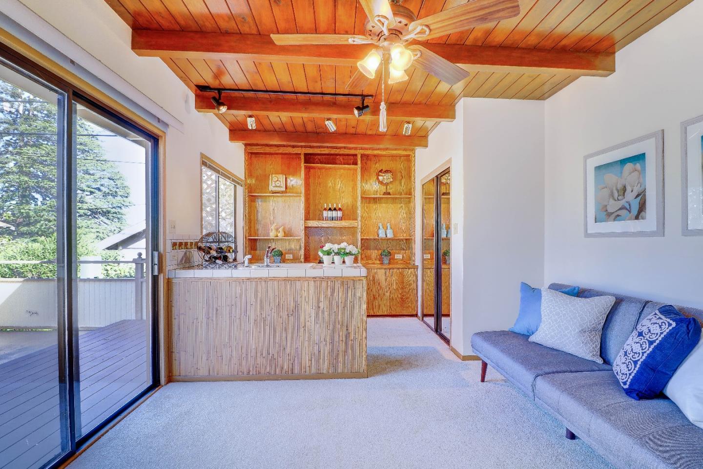 2701 Hillside Drive Burlingame, CA 94010 - Photo 34 of 50 a living room with furniture and a large window