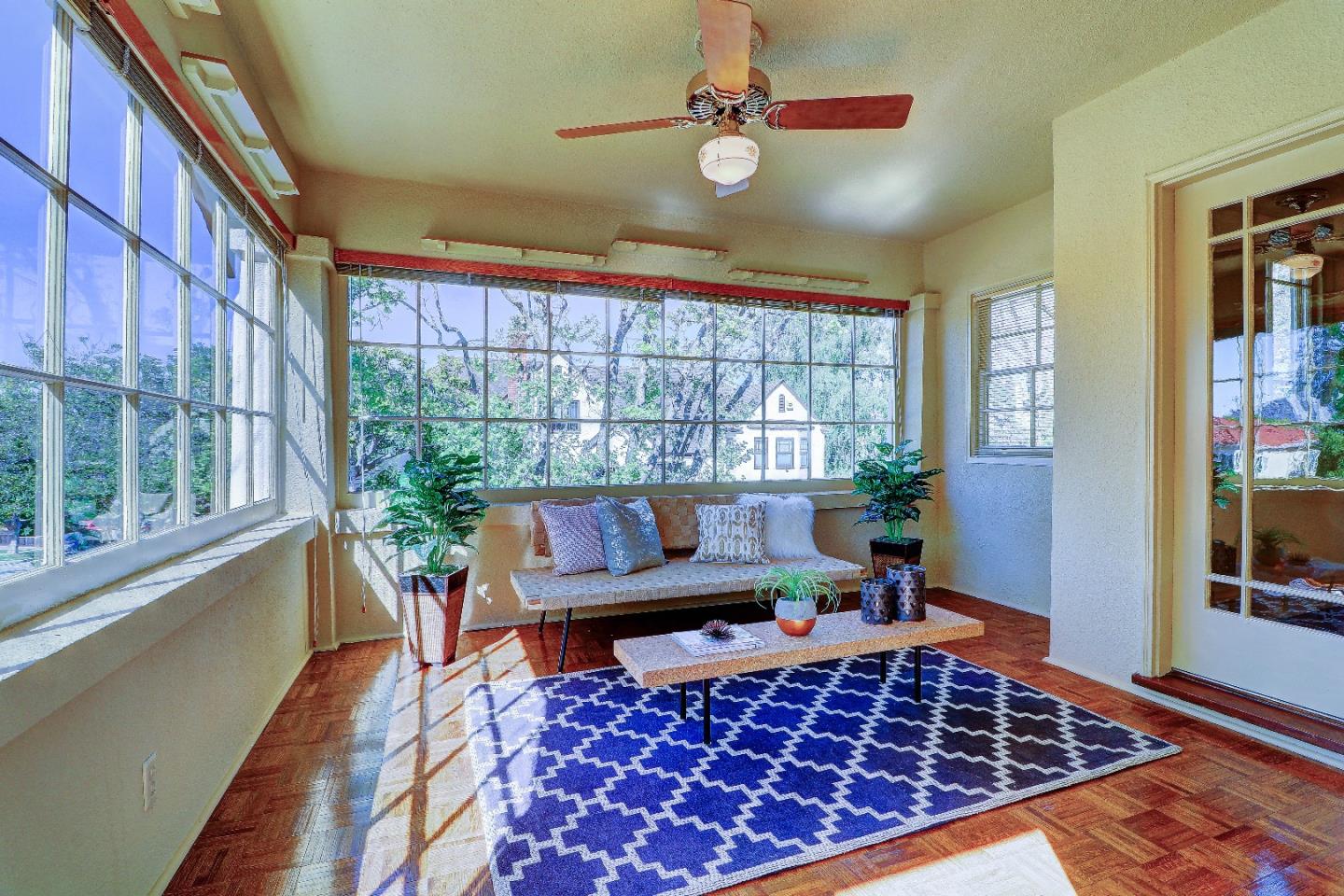 2701 Hillside Drive Burlingame, CA 94010 - Photo 8 of 50 a living room with furniture rug and window