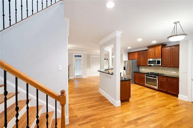 a large kitchen with cabinets