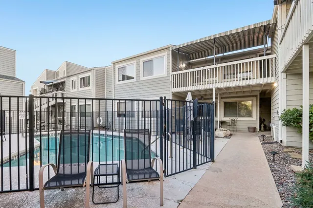 a balcony view with a garden space