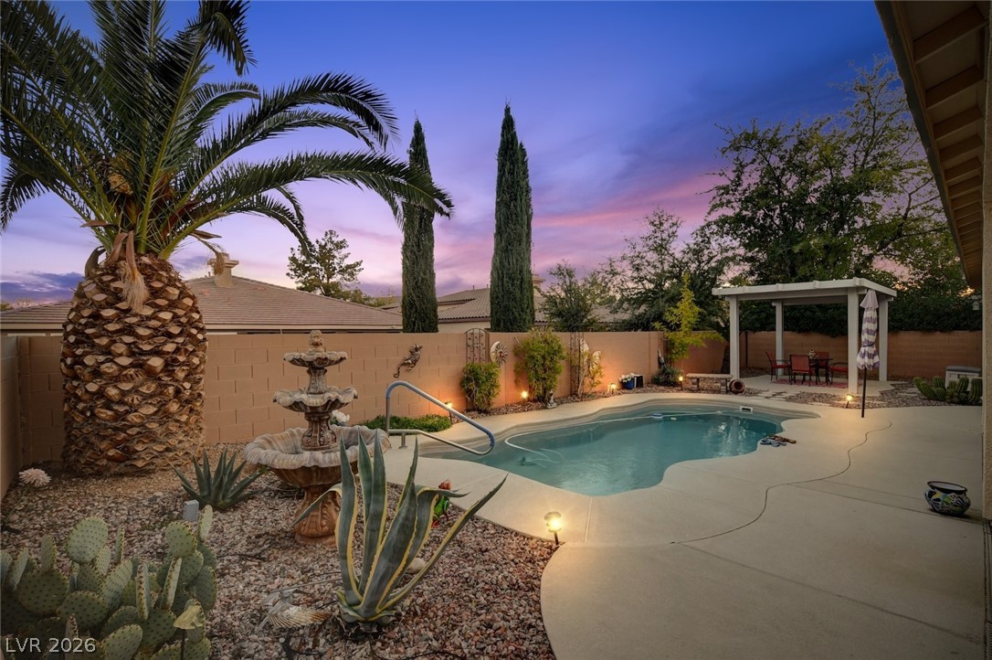 4453 Rometta Avenue Las Vegas, NV 89141 - Photo 2 of 76 a private backyard with mature landscaping and relaxing pool!