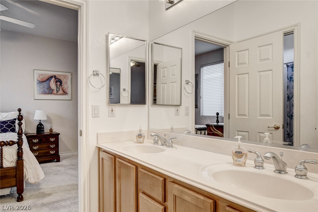 4453 Rometta Avenue Las Vegas, NV 89141 - Photo 39 of 76 jack and jill bath between bedroom 2 & 3