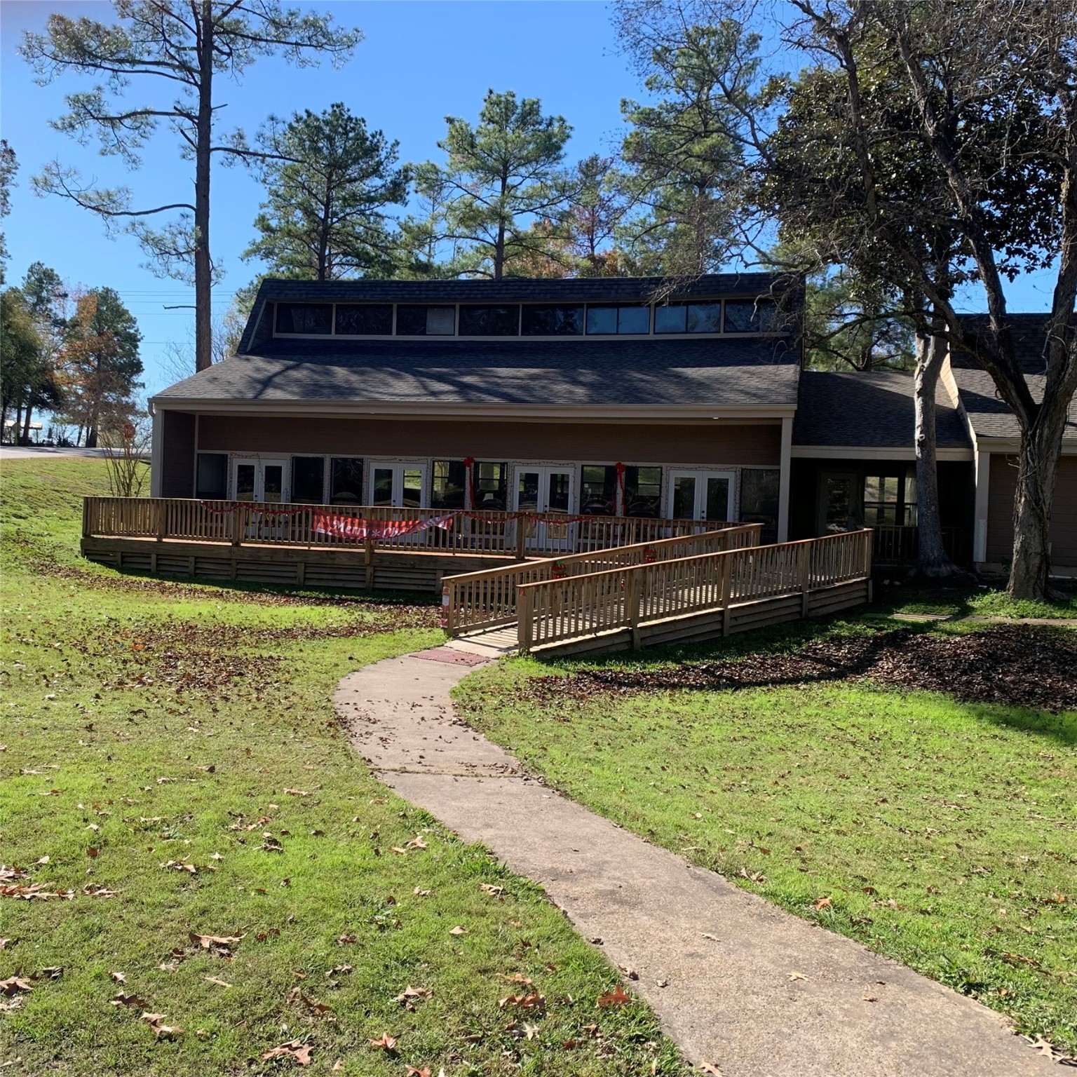 171 Cherry Tree Livingston, TX 77351 - Photo 4 of 10 a view of swimming pool with lawn chairs and plants