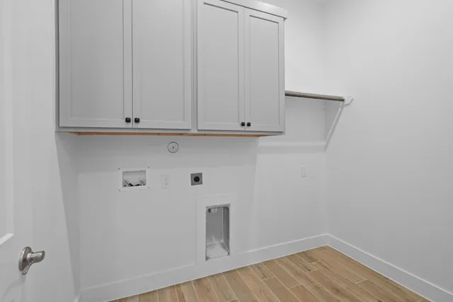 a view of room with cabinets