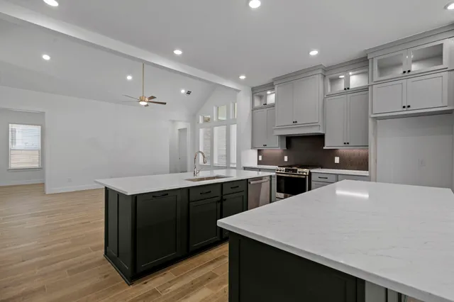 a large kitchen with cabinets