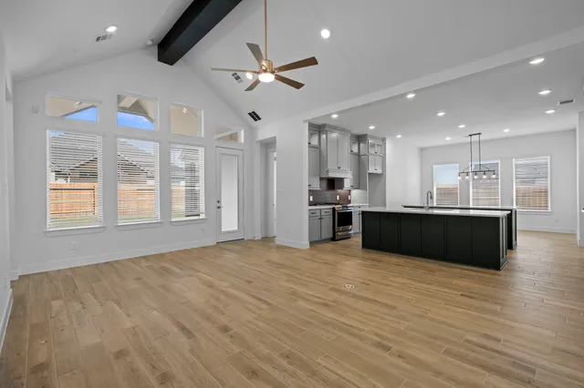 a view of kitchen and windows