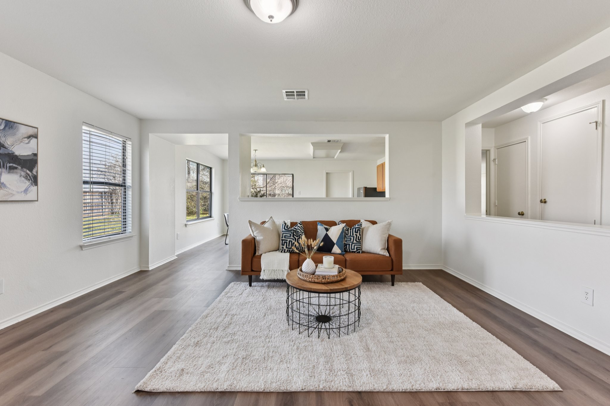 101 Bandara Woods Boulevard Elgin, TX 78621 - Photo 10 of 30 Living area featuring dark wood-style floors
