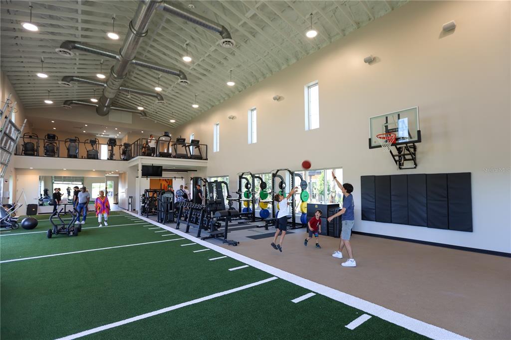 3322 Bitterroot Lane Lakewood Ranch, FL 34211 - Photo 44 of 50 a view of a room with gym equipment