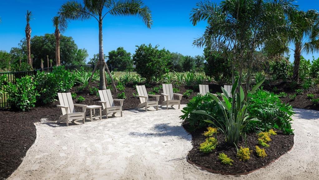 3322 Bitterroot Lane Lakewood Ranch, FL 34211 - Photo 45 of 50 a view of a chairs and tables in the patio