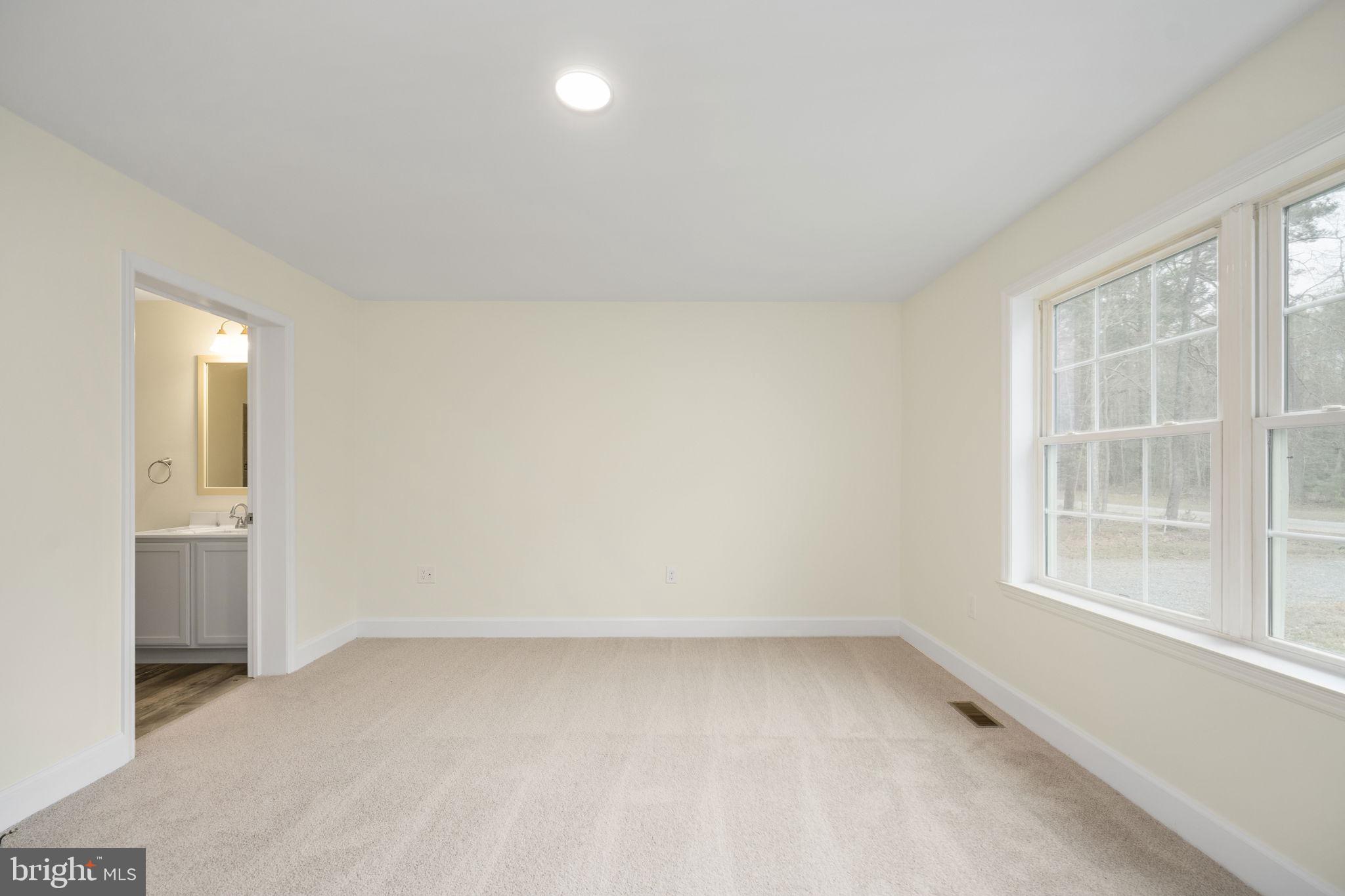 300 River Oaks Road Center Cross, VA 22437 - Photo 26 of 39 Bright and airy living space awaits.
