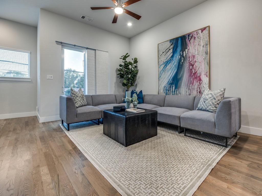 1129 Manderly Court Dallas, TX 75204 - Photo 11 of 33 Living room featuring a ceiling fan, light wood-style flooring, and recessed lighting