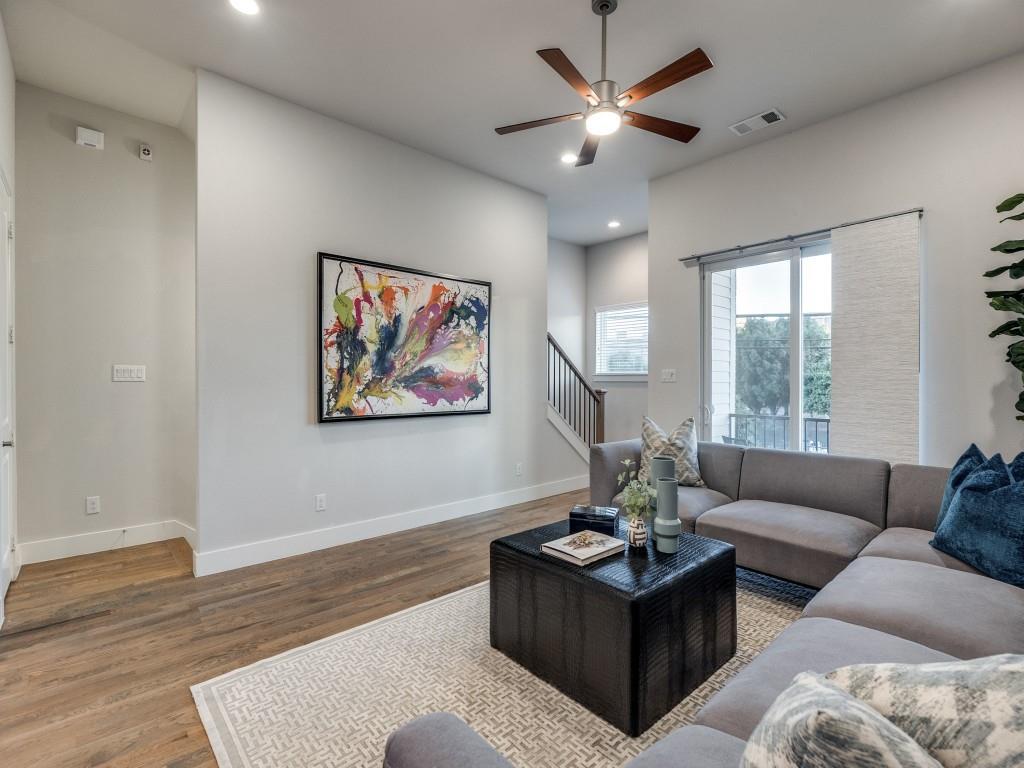 1129 Manderly Court Dallas, TX 75204 - Photo 13 of 33 Living area with wood finished floors, a ceiling fan, recessed lighting, and stairway