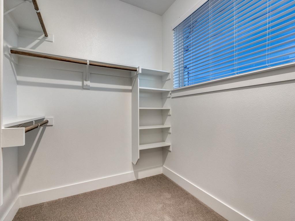 1129 Manderly Court Dallas, TX 75204 - Photo 25 of 33 Spacious closet featuring light colored carpet