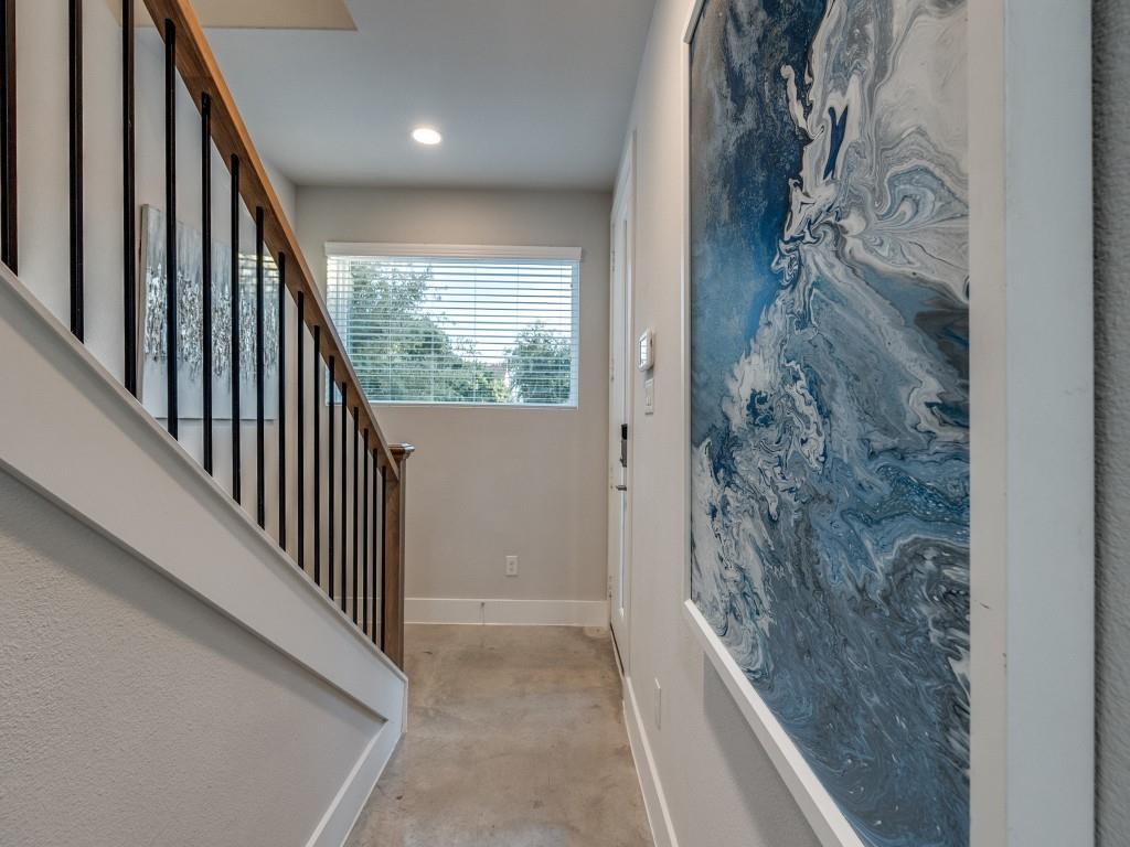 1129 Manderly Court Dallas, TX 75204 - Photo 6 of 33 Entryway with concrete floors and stairway