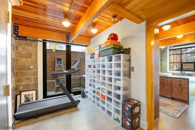 a bathroom with a toilet and shower