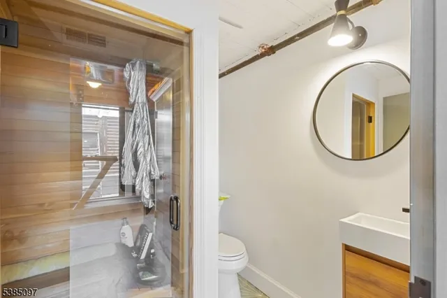 a view of a hallway with washer and dryer