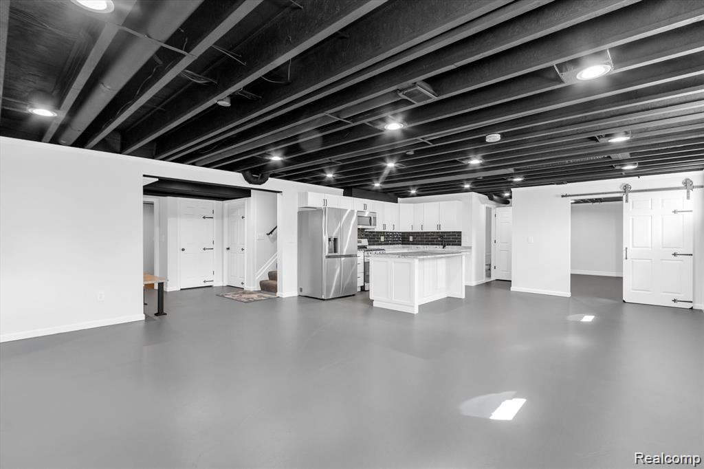 9769 Stark Road Livonia, MI 48150 - Photo 36 of 64 Over 2100 sqft of finished basement.