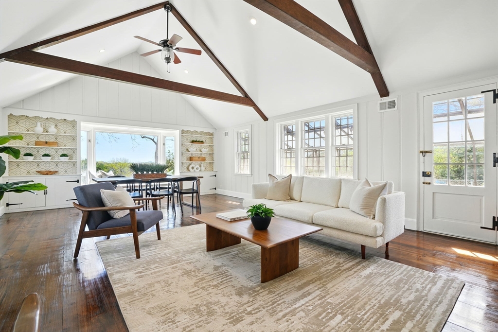 181 Grove Street Cambridge, MA 02138 - Photo 1 of 22 a living room with furniture and wooden floor