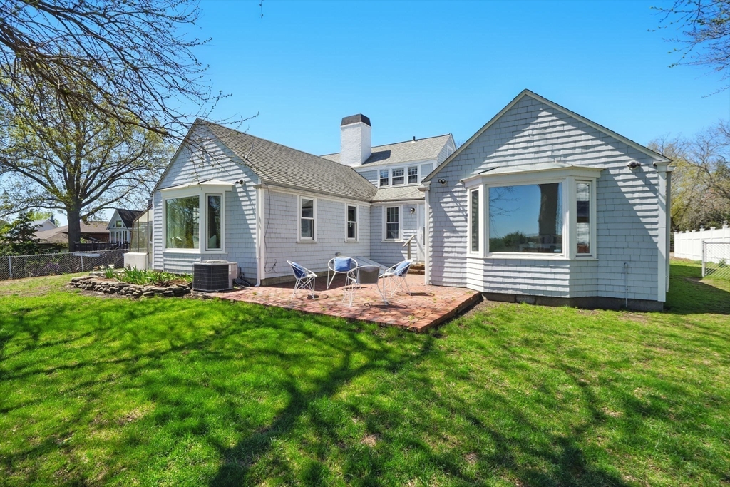181 Grove Street Cambridge, MA 02138 - Photo 17 of 22 a front view of house with yard and outdoor seating