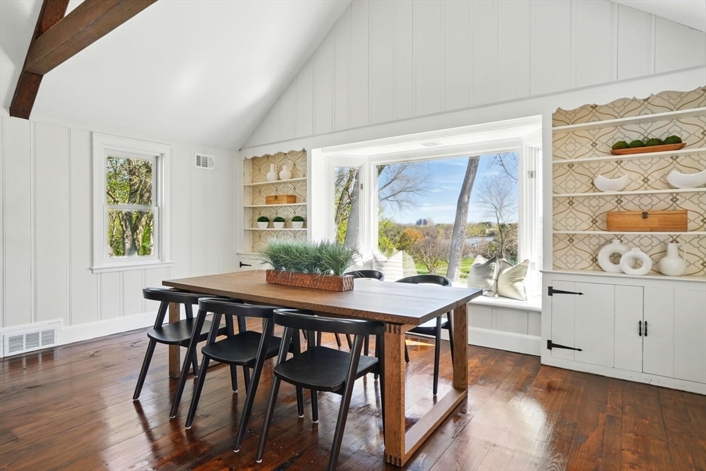 181 Grove Street Cambridge, MA 02138 - Photo 3 of 22 a view of a dining room with furniture window and wooden floor