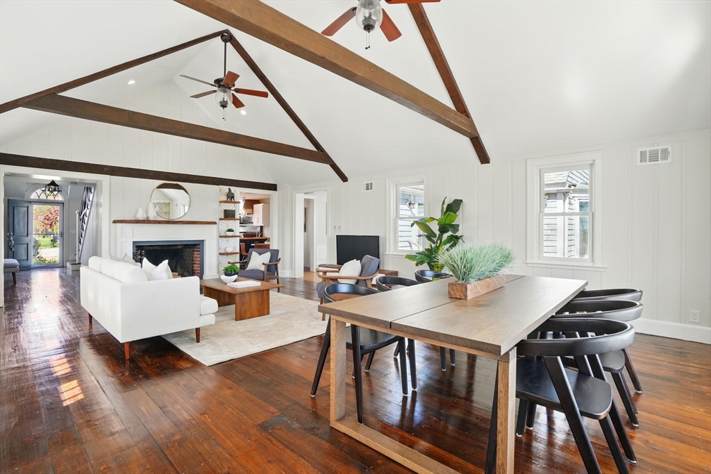 181 Grove Street Cambridge, MA 02138 - Photo 4 of 22 a view of a dining room with furniture wooden floor and a chandelier