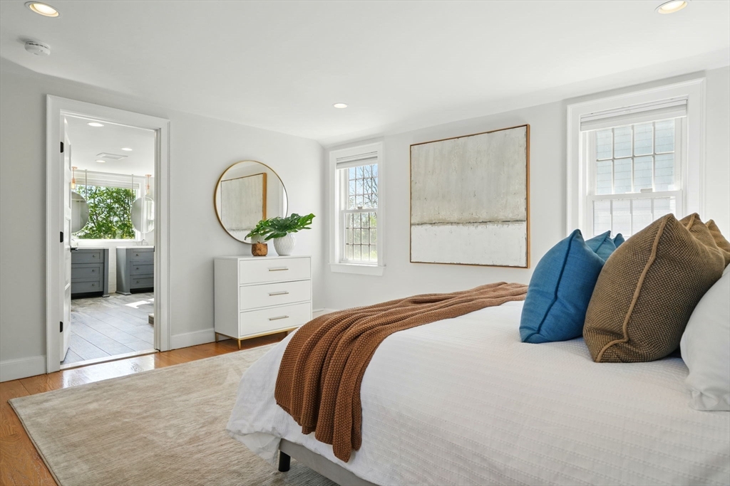 181 Grove Street Cambridge, MA 02138 - Photo 8 of 22 a bedroom with a large bed and a large window