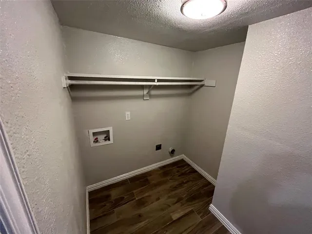 a stove top oven sitting inside of a kitchen