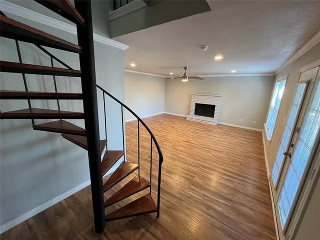 a kitchen with granite countertop cabinets and sink