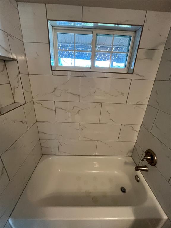 3053 Rotan Lane Dallas, TX 75229 - Photo 13 of 32 Bathroom featuring shower combination