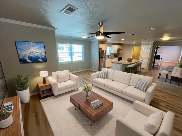 a view of a living room and dining room