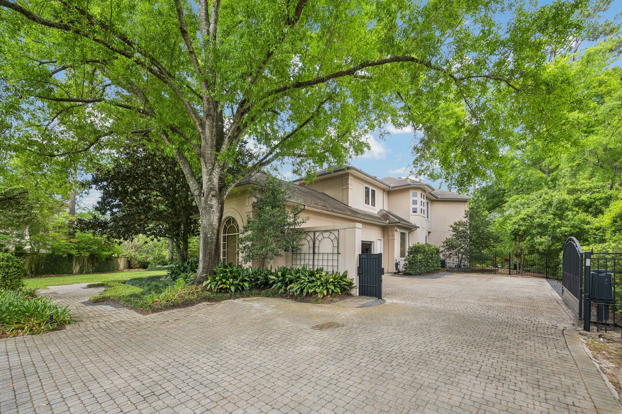 6 Mott Lane Houston, TX 77024 - Photo 3 of 47 Paver driveway with gate and extra parking