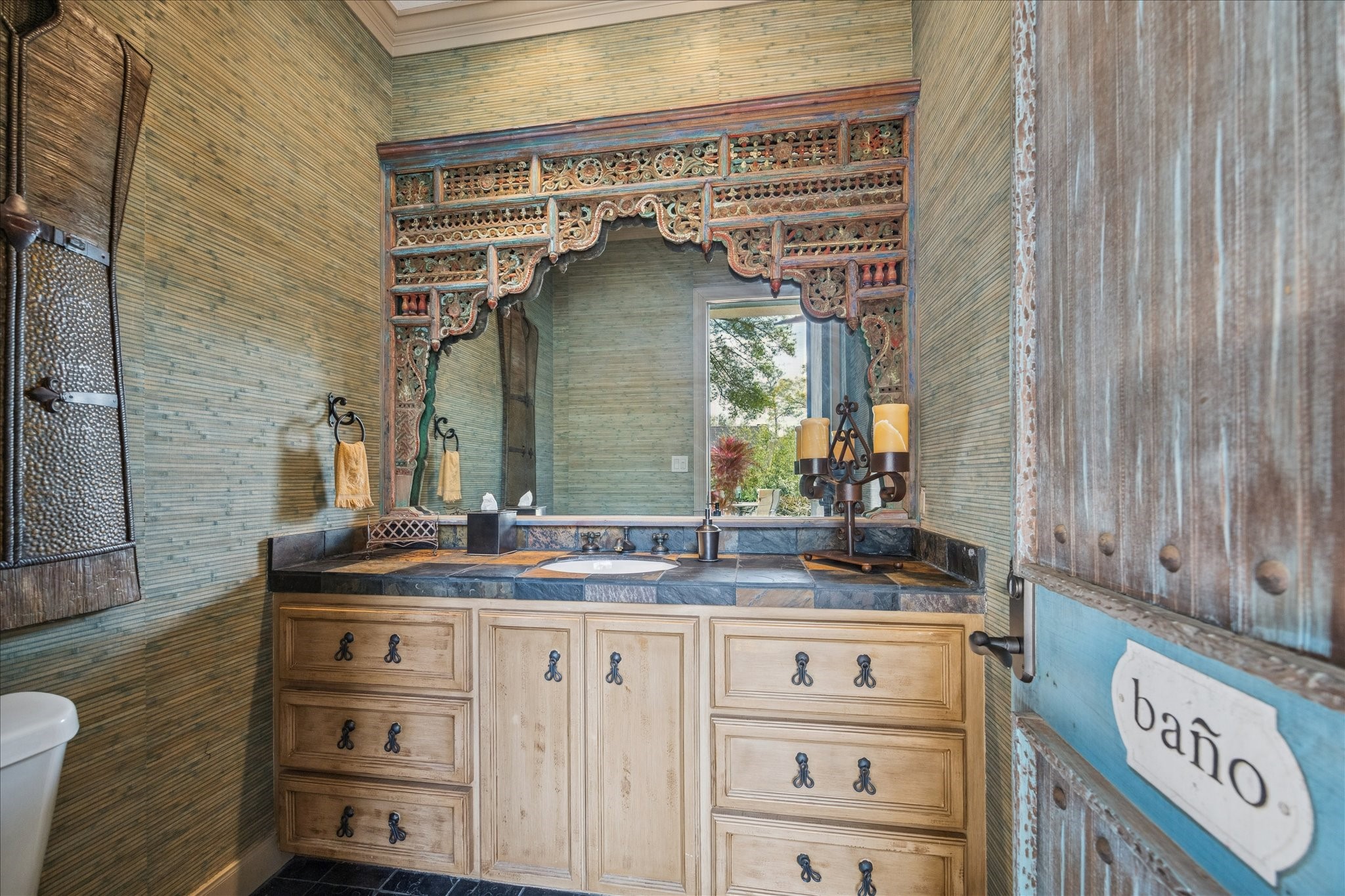 6 Mott Lane Houston, TX 77024 - Photo 39 of 49 a bathroom with a granite countertop sink and a mirror