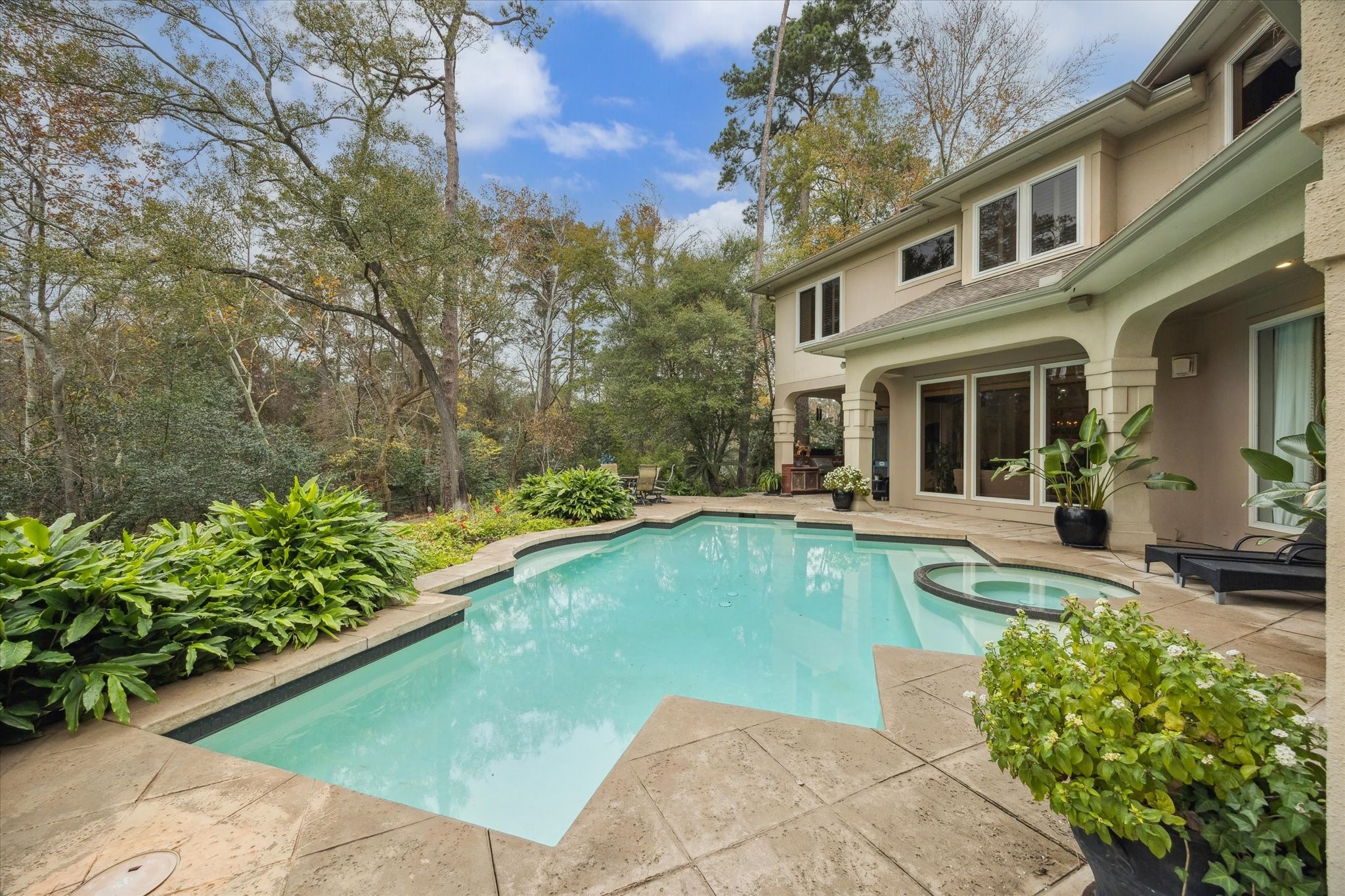 6 Mott Lane Houston, TX 77024 - Photo 43 of 49 a view of a house with swimming pool and sitting area