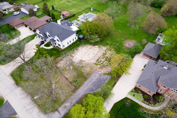 an aerial view of residential house with outdoor space
