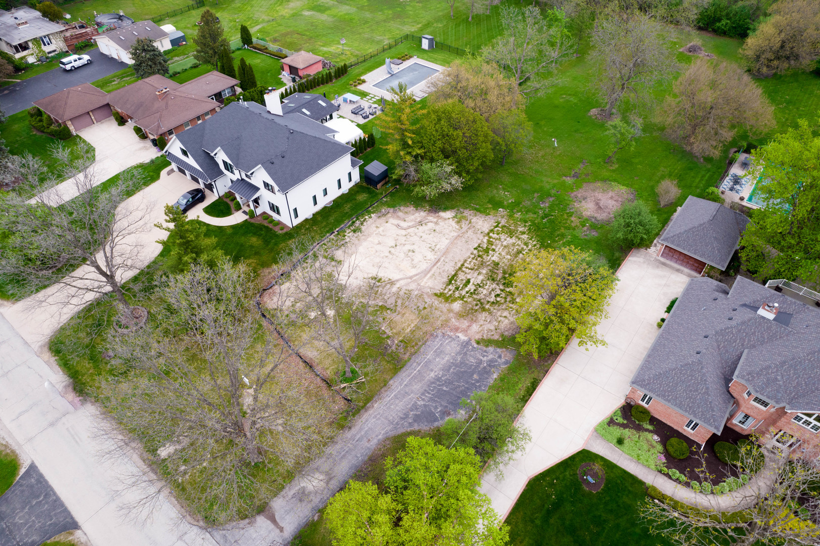 an aerial view of residential house with outdoor space
