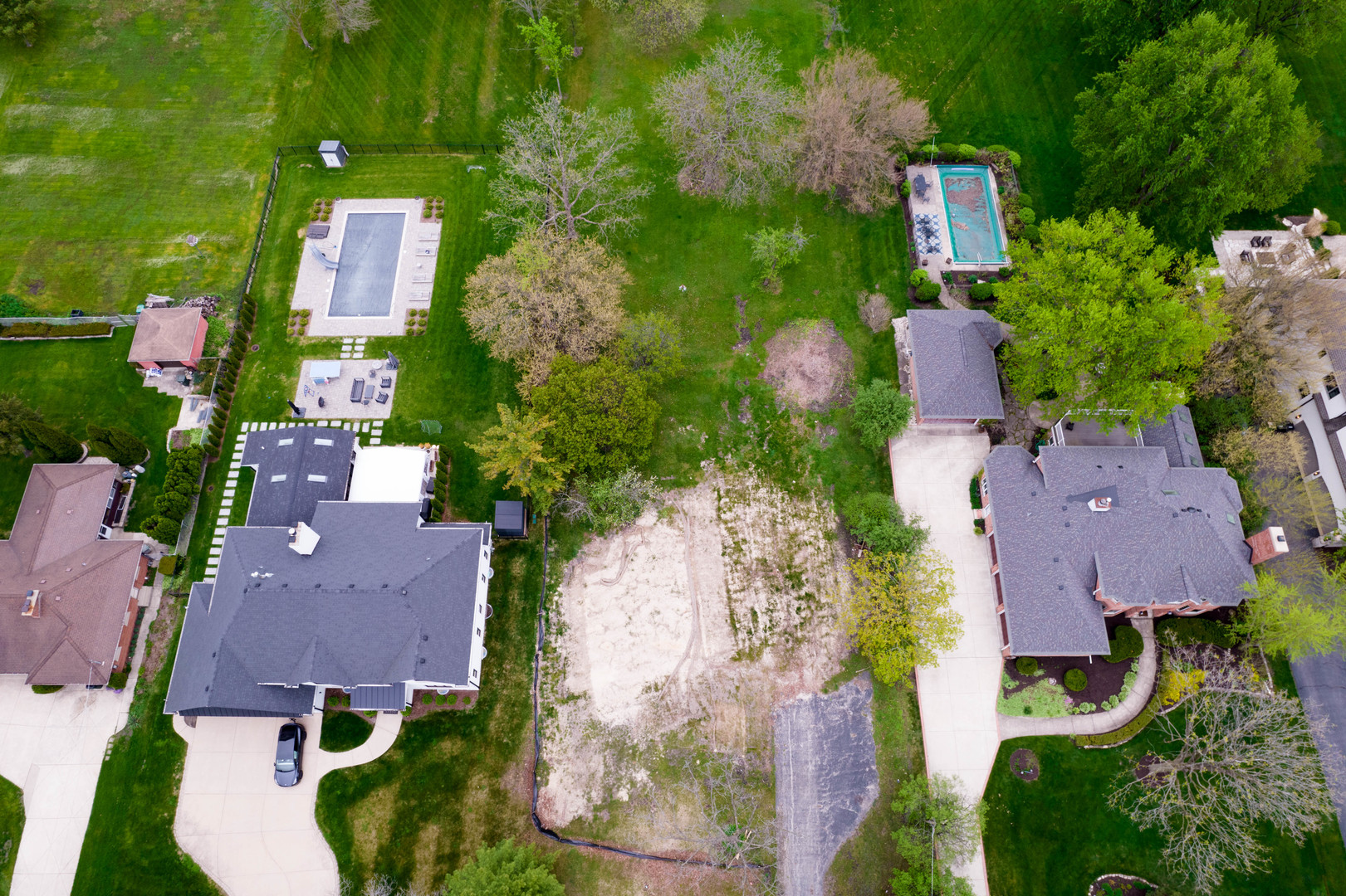 7725 Drew Avenue Burr Ridge, IL 60527 - Photo 2 of 5 an aerial view of residential houses with outdoor space and street view