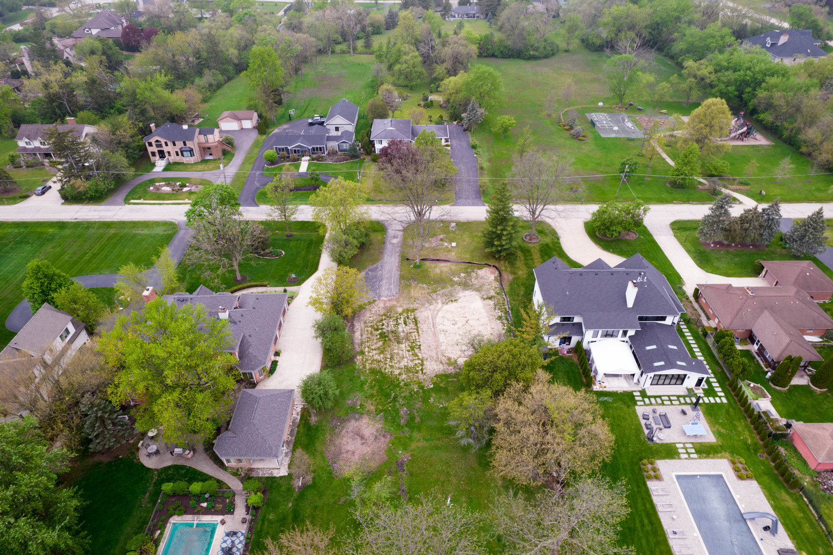7725 Drew Avenue Burr Ridge, IL 60527 - Photo 3 of 5 an aerial view of house with yard