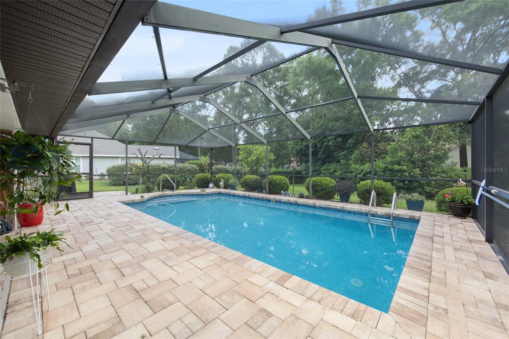 18825 Southwest 93rd Loop Dunnellon, FL 34432 - Photo 55 of 85 a view of outdoor space swimming pool and furniture