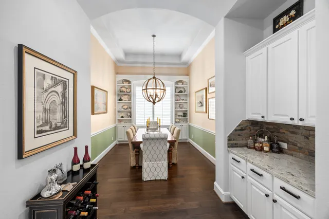 a view of a livingroom with furniture window and wooden floor