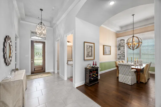 a living room with furniture fireplace and flat screen tv