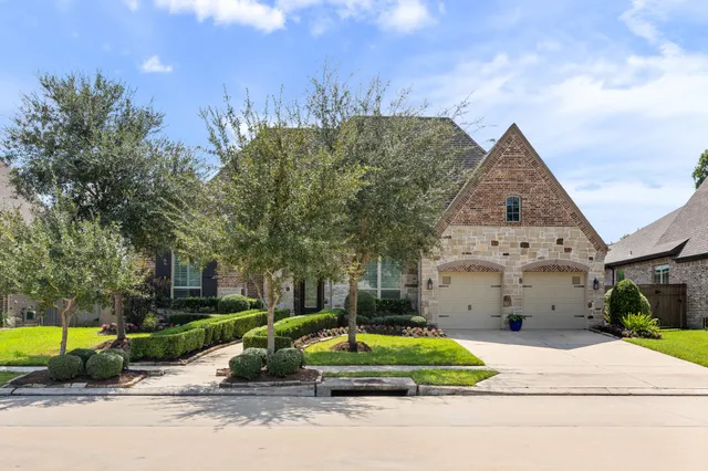 a house with trees in the background