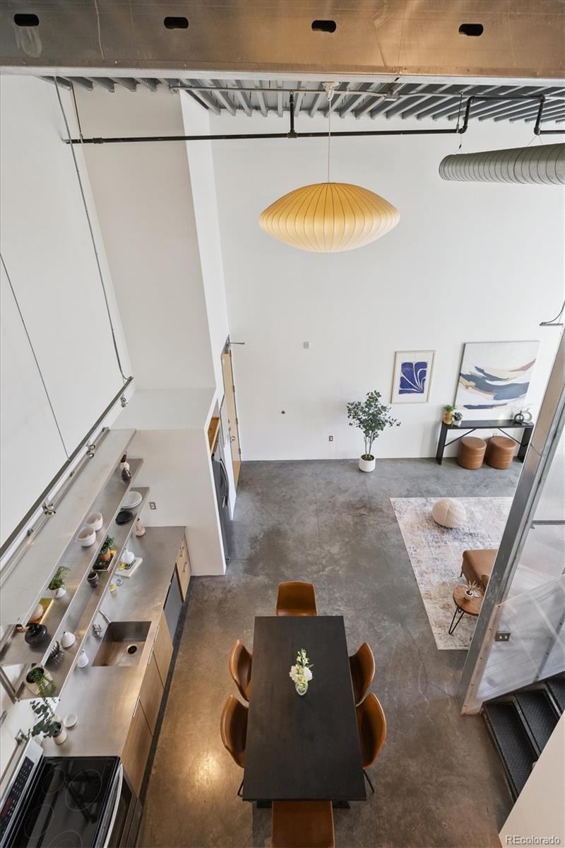 3457 Ringsby Court, Unit 320 Denver, CO 80216 - Photo 18 of 41 a view of a kitchen with a sink