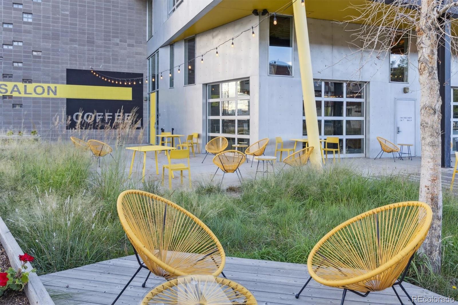 3457 Ringsby Court, Unit 320 Denver, CO 80216 - Photo 39 of 41 a view of a swimming pool with a seating space