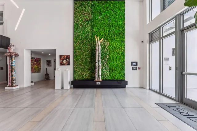 a view of an entryway with garden