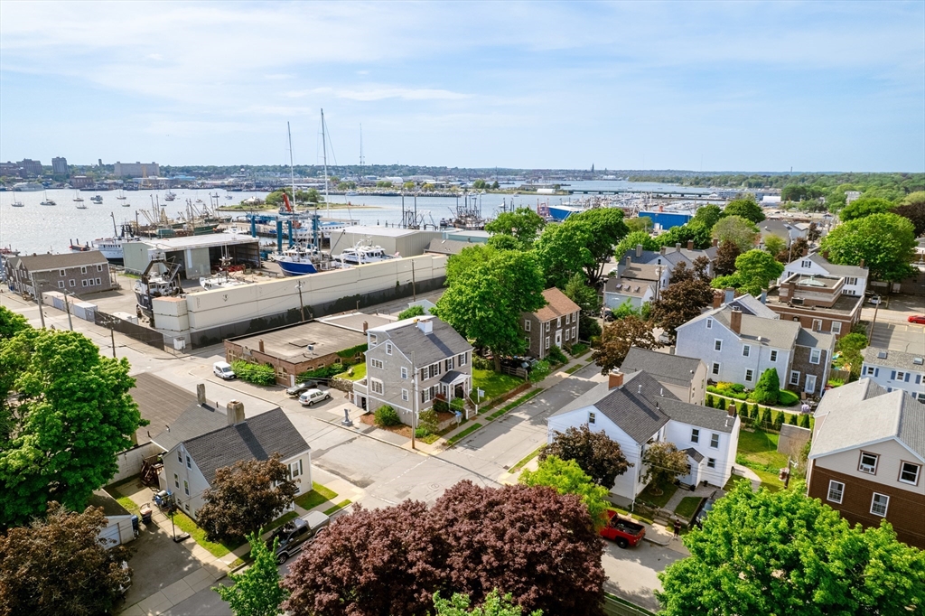 16 Middle Street Fairhaven, MA 02719 - Photo 1 of 34 an aerial view of a house with a ocean view