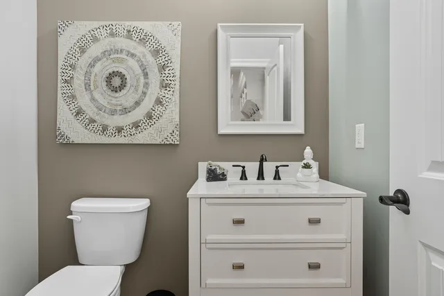 a bed room with a bed and a large window