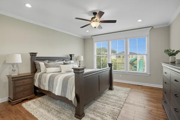 a bathroom with a sink double vanity granite and a mirror