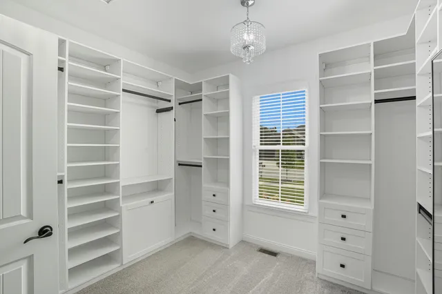 a bathroom with a sink a vanity and a mirror